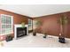 Cozy living room with a fireplace, large windows, and space for relaxation and entertainment at 2601 Brandenberry Dr, Decatur, GA 30034