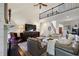 Open concept living room featuring shiplap walls, fireplace, hardwood floors, and a staircase to the upper level at 1021 Bluffhaven Ne Way, Atlanta, GA 30319