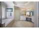Serene main bathroom featuring a soaking tub, separate vanities, and a makeup area for added comfort at 1021 Bluffhaven Ne Way, Atlanta, GA 30319