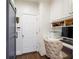 Convenient office nook with custom cabinets and shelving, desk space, and natural lighting at 1021 Bluffhaven Ne Way, Atlanta, GA 30319