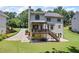Back of house with upper and lower decks overlooking large backyard at 2500 Ashbourne Dr, Lawrenceville, GA 30043