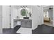 Bathroom vanity with modern vessel sink and tile floor at 2500 Ashbourne Dr, Lawrenceville, GA 30043