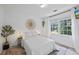 Bedroom with plush carpet, white curtains, and bright natural light at 2500 Ashbourne Dr, Lawrenceville, GA 30043