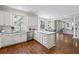 Spacious kitchen with white cabinets, an island, and stainless steel dishwasher at 2500 Ashbourne Dr, Lawrenceville, GA 30043