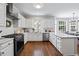 Well-appointed kitchen with modern appliances and marble countertops at 2500 Ashbourne Dr, Lawrenceville, GA 30043