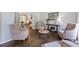 Elegant living room with hardwood floors and neutral-toned furniture at 2500 Ashbourne Dr, Lawrenceville, GA 30043