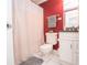 Bathroom with white fixtures, gray countertops, and a shower-tub with curtain at 300 Peachtree Ne St # 11C, Atlanta, GA 30308