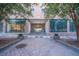 Attractive entrance to the property with lovely landscaping and well-kept building at 300 Peachtree Ne St # 11C, Atlanta, GA 30308