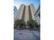 Stunning high-rise building with modern architecture and mature landscaping at 300 Peachtree Ne St # 11C, Atlanta, GA 30308