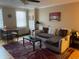 Cozy living room featuring natural light, comfortable seating, and a relaxing atmosphere at 300 Peachtree Ne St # 11C, Atlanta, GA 30308