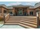 Inviting outdoor deck space perfect for entertaining, with ample seating and brick home backdrop at 3505 Watson Rd, Cumming, GA 30028