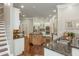 Spacious kitchen with stainless steel appliances, a center island, and beautiful granite countertops at 3505 Watson Rd, Cumming, GA 30028