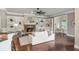 Cozy living room with fireplace, built-in shelving, and hardwood floors at 3505 Watson Rd, Cumming, GA 30028