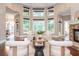 Bright and airy living room with large windows, modern furniture, and open layout at 3505 Watson Rd, Cumming, GA 30028