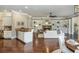Bright living space connects kitchen and dining areas, features built-in shelves, and natural light at 3505 Watson Rd, Cumming, GA 30028
