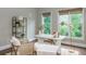 Well-lit office features two large windows, neutral walls, and modern furnishings at 3505 Watson Rd, Cumming, GA 30028
