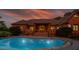 Swimming pool with brick house backdrop and deck and plenty of yard space, great for summer fun at 3505 Watson Rd, Cumming, GA 30028