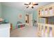 Light-filled bedroom with a bunk bed, playroom accessories, and soft, neutral carpet at 6202 Oakdale Ridge Se Ct, Mableton, GA 30126