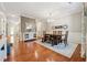Formal dining room with hardwood floors, decorative wainscoting, traditional chandelier, and neutral color scheme at 6202 Oakdale Ridge Se Ct, Mableton, GA 30126
