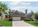 Charming two-story home with a brick and siding exterior, a two-car garage, and a well-manicured lawn at 6202 Oakdale Ridge Se Ct, Mableton, GA 30126