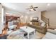 The open concept living room flows into the kitchen and features hardwood flooring throughout at 6202 Oakdale Ridge Se Ct, Mableton, GA 30126