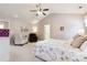 The main bedroom offers a ceiling fan, seating area, carpet, and lots of closet space at 6202 Oakdale Ridge Se Ct, Mableton, GA 30126