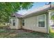 Backyard featuring vinyl siding, windows and patio at 876 Ashton Oak Cir, Stone Mountain, GA 30083