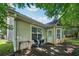 Backyard featuring vinyl siding, windows and patio at 876 Ashton Oak Cir, Stone Mountain, GA 30083