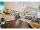 Bright living room with vaulted ceilings, hardwood floors, and a fireplace at 876 Ashton Oak Cir, Stone Mountain, GA 30083