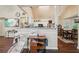 Bright and airy living room adjacent to the kitchen and dining areas at 876 Ashton Oak Cir, Stone Mountain, GA 30083