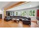 Bright living room with hardwood floors and a comfortable sectional sofa, perfect for Gathering gatherings at 2121 Jep Wheeler Rd, Woodstock, GA 30188