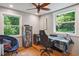 Bright home office with natural light and stylish decor, creating an inspiring workspace at 2121 Jep Wheeler Rd, Woodstock, GA 30188