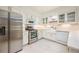 Modern kitchen featuring stainless steel appliances, white cabinetry, and quartz countertops at 225 E Ponce De Leon Ave # 310, Decatur, GA 30030