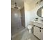 Modern bathroom with a tiled shower, vanity, and contemporary fixtures at 2873 Shoals Hill Ct, Dacula, GA 30019