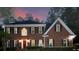 Attractive two-story brick home with black shutters, a manicured lawn, and a dark roof at 4673 Jefferson Township Pl, Marietta, GA 30066