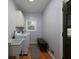 Functional laundry room with washer, dryer, sink and bench at 4673 Jefferson Township Pl, Marietta, GA 30066