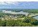 Great aerial view of lake, trees, roads, and building at 4847 Lakewood Dr, Acworth, GA 30101
