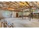 Spacious unfinished basement with concrete floors, exposed beams, and great potential for customization at 4847 Lakewood Dr, Acworth, GA 30101
