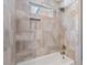 Close up of a bathroom, showcasing tile work, niche, and fixtures at 4847 Lakewood Dr, Acworth, GA 30101