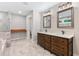 The bathroom includes a dual sink vanity, walk-in shower, and tiled flooring at 4847 Lakewood Dr, Acworth, GA 30101