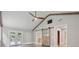 Bedroom features include a ceiling fan, vaulted ceiling, exposed beams, and barn door at 4847 Lakewood Dr, Acworth, GA 30101