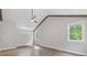 Bright bedroom featuring a ceiling fan, neutral walls, and hardwood floors at 4847 Lakewood Dr, Acworth, GA 30101