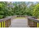 A quaint deck offers the perfect setting for enjoying the outdoors at 4847 Lakewood Dr, Acworth, GA 30101