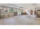 A well lit garage space has multiple storage shelves and work areas at 4847 Lakewood Dr, Acworth, GA 30101