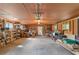 The extra large garage has a work space, shelving, and storage for many needs at 4847 Lakewood Dr, Acworth, GA 30101