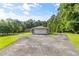 Front exterior view of home with an attached two-car garage and long paved driveway at 4847 Lakewood Dr, Acworth, GA 30101