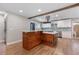 Well-designed kitchen boasts a breakfast bar island, modern stainless appliances, and neutral cabinets at 4847 Lakewood Dr, Acworth, GA 30101