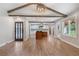 Bright, open kitchen with a large island, modern appliances, and stylish finishes and beams at 4847 Lakewood Dr, Acworth, GA 30101