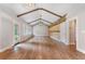 Expansive living area with wooden floors, exposed beams and ample natural light at 4847 Lakewood Dr, Acworth, GA 30101