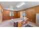 A spacious office space offers a large desk and storage cabinets at 4847 Lakewood Dr, Acworth, GA 30101